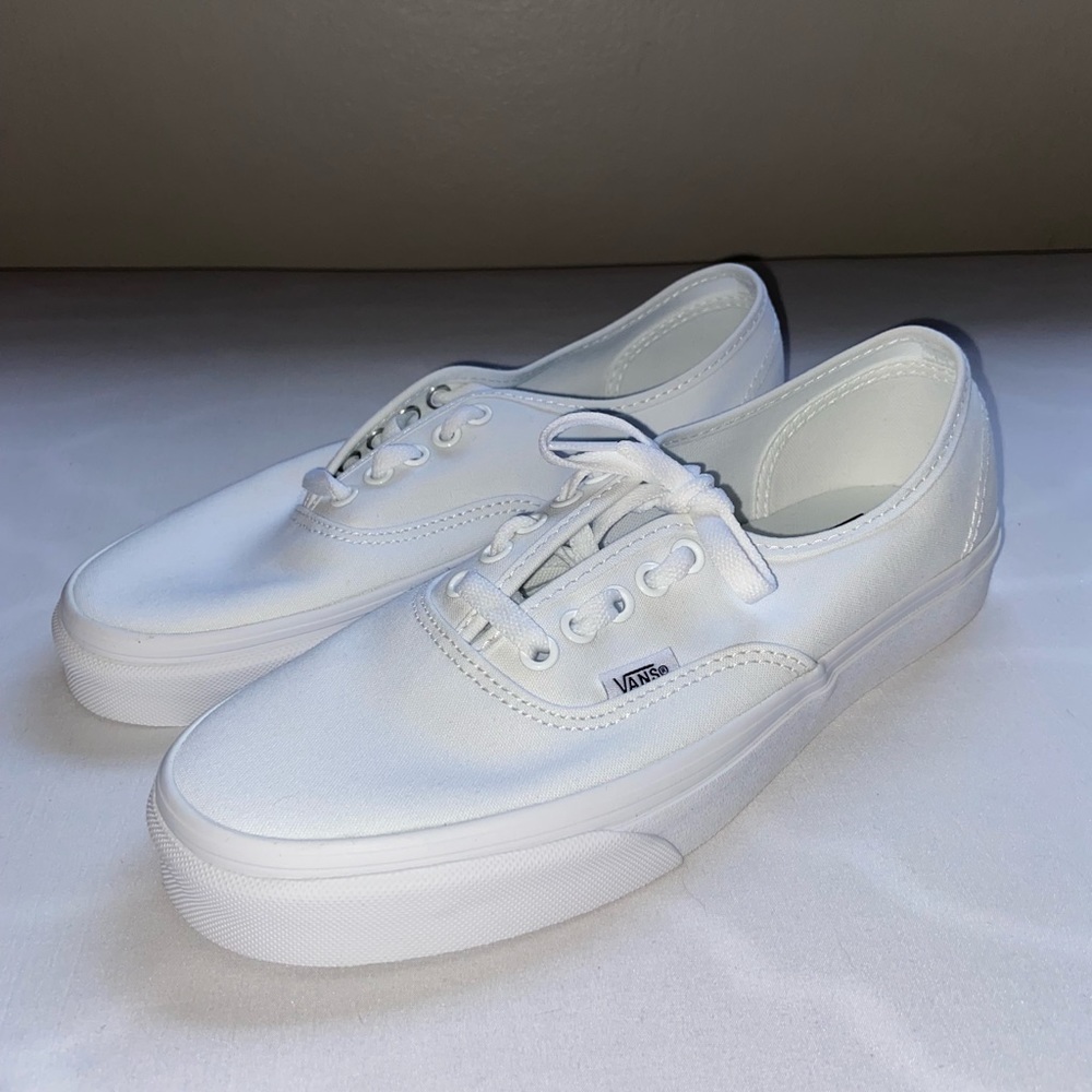 white vans, size 8 in men’s & size 9.5 in women’s